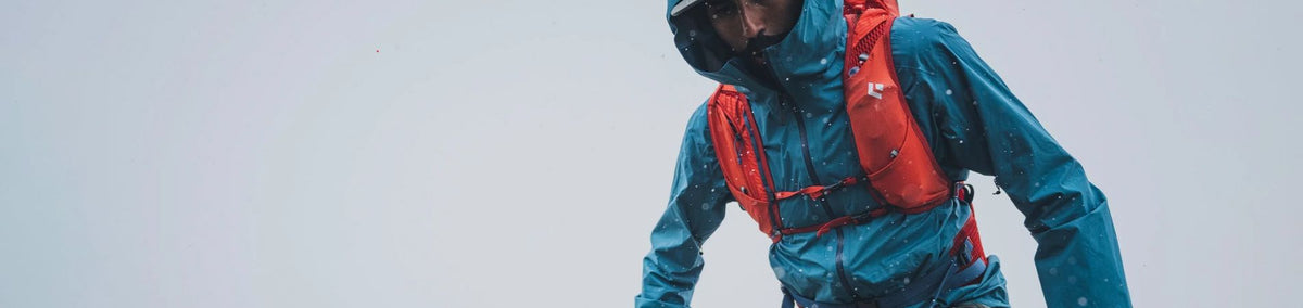 Man in blue jacket in the rain